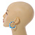 Trendy Pale Blue/ Sky Blue Animal Print Acrylic Hoop Earrings In Gold Tone - 43mm Diameter - Medium - view 2