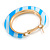 Trendy Pale Blue/ Sky Blue Animal Print Acrylic Hoop Earrings In Gold Tone - 43mm Diameter - Medium - view 7