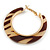 Trendy Light Caramel/ Brown Animal Print Acrylic Hoop Earrings In Gold Tone - 43mm Diameter - Medium - view 6