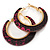 Trendy Magenta/ Black Floral Print Acrylic Hoop Earrings In Gold Tone - 43mm Diameter - Medium - view 4