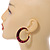 Trendy Magenta/ Black Floral Print Acrylic Hoop Earrings In Gold Tone - 43mm Diameter - Medium - view 3