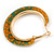 Trendy Orange/ Green Floral Print Acrylic Hoop Earrings In Gold Tone - 43mm Diameter - Medium - view 6