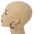 Trendy Black/ White Floral Print Acrylic Hoop Earrings In Gold Tone - 43mm Diameter - Medium - view 2