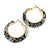 Trendy Black/ White Floral Print Acrylic Hoop Earrings In Gold Tone - 43mm Diameter - Medium - view 5