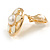 15mm Gold Tone White Enamel Flower Round Clip On Earrings - view 5