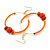 50mm Orange Glass and Wooden Bead Hoop Earrings in Gold Tone - 75mm Drop - view 2