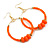 50mm Large Orange Glass, Acrylic Bead Hoop Earrings in Gold Tone - 75mm Drop - view 5