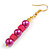 Deep Pink/ Magenta Glass and Wood Bead Drop Earrings in Gold Tone - 60mm L - view 6