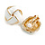 White Enamel Square Knot Motif Clip On Earrings In Gold Tone - 18mm Across - view 2
