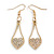 Clear Crystal Open Heart Drop Earrings in Gold Tone - 55mm L