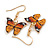 Small Butterfly Drop Earrings in Gold Tone (Orange/Black Colours) - 35mm L - view 2