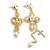 Cupid and Cross Dangle Assymetrical Earrings in Bright Gold Tone - 90mm Long