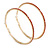 Oversized Slim Red Crystal Hoop Earrings In Gold Tone - 75mm Diameter - view 2