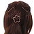 Set Of Twisted Hair Slides and Open Flower Hair Slide/ Grip In Gold Tone Metal - view 3