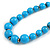 Light Blue/ Teal Graduated Wooden Bead Necklace - 70cm Long (UNEVENLY PAINTED IN PLACES) - view 3