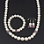 White Simulated Glass Pearl Necklace, Flex Bracelet & Drop Earrings Set With Diamante Rings & Pink Beads - 38cm Length - view 7