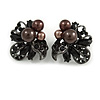 Striking Crystal Faux Pearl Floral Clip On Earrings In Gun Metal Finish - 28mm Diameter