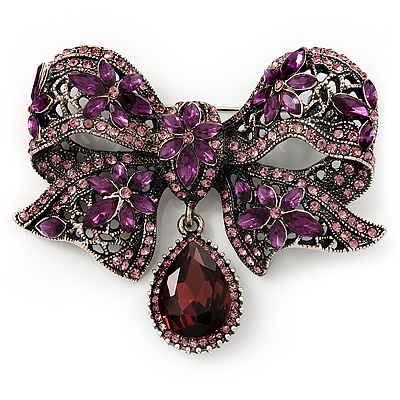 Luxurious CZ Purple Bow Brooch In Gun Metal Finish